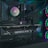 The image depicts the inside of a computer case featuring a high-performance graphics card labeled 'GEFORCE RTX' with RGB lighting. The cooling fans are illuminated with vibrant colors, creating a visually striking look. Various cables and components are neatly arranged, highlighting advanced hardware and a focus on aesthetics.